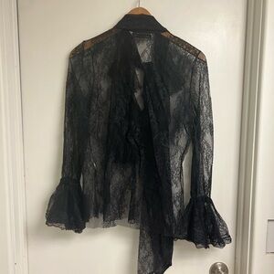 Lace blouse with ruffles and tie by Zara